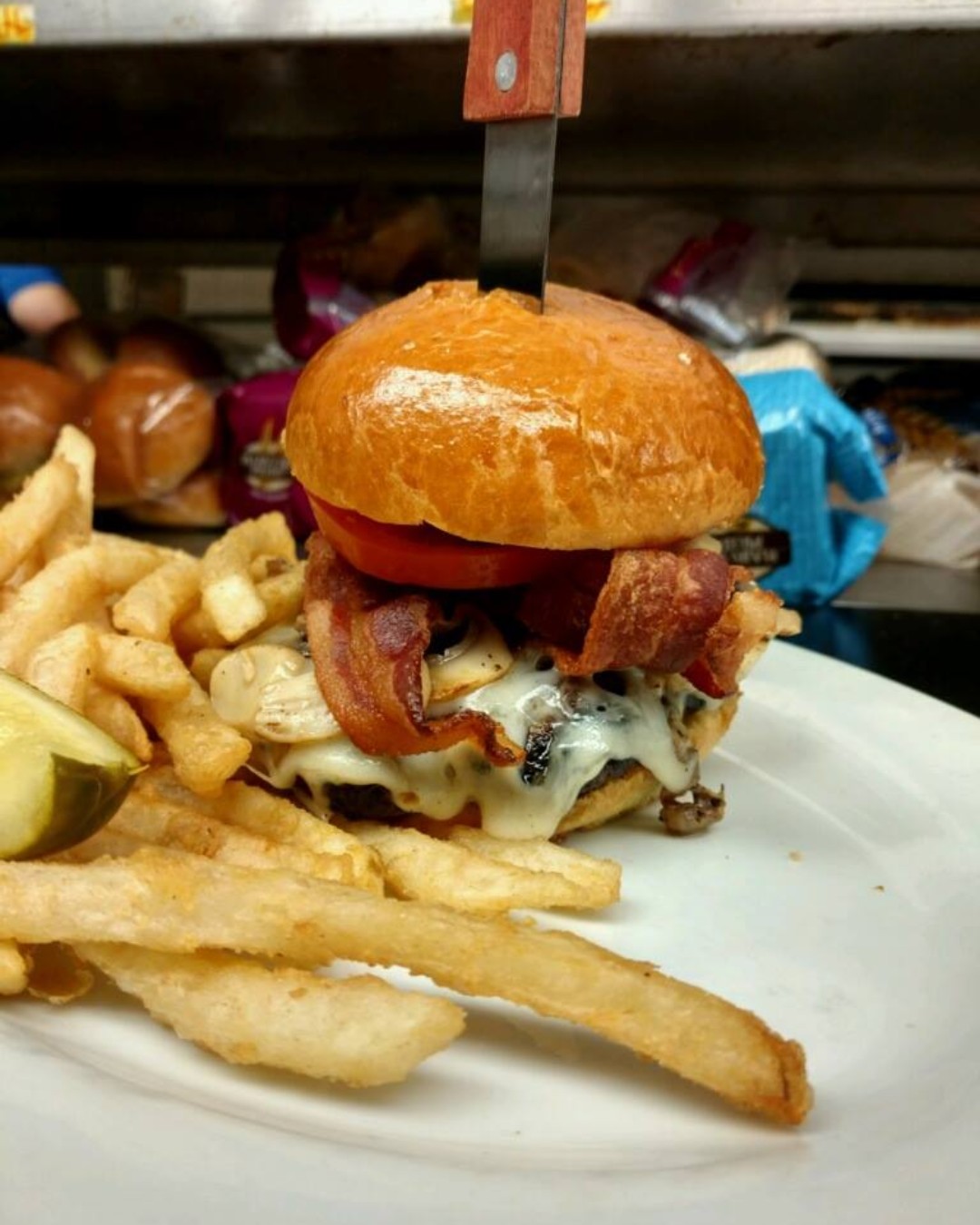 A plate with fries and a burger