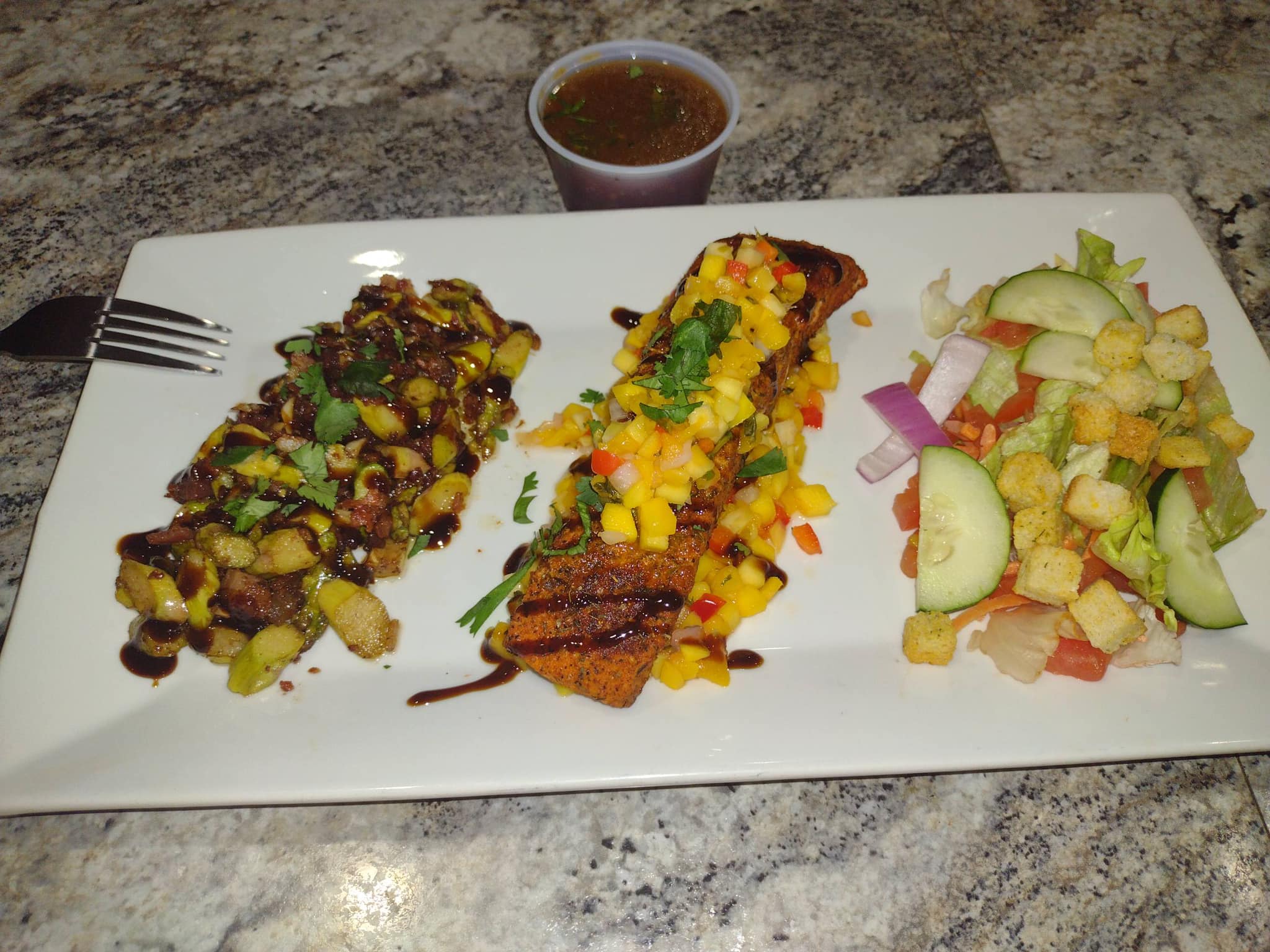a plate of Mango Salmon
