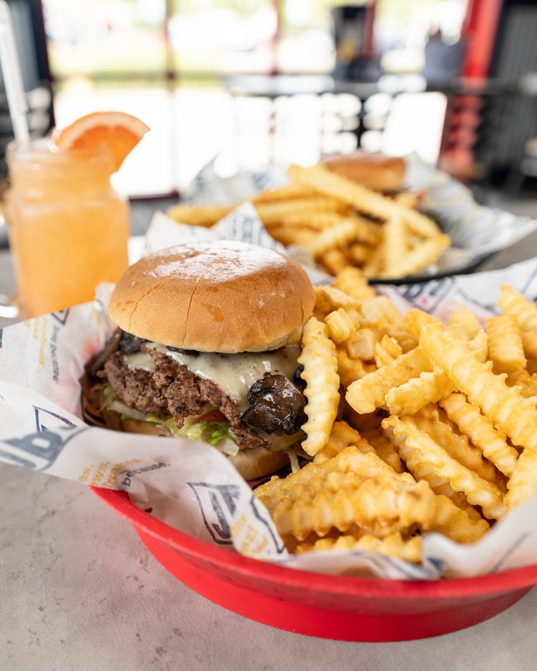 a smash burger with fries