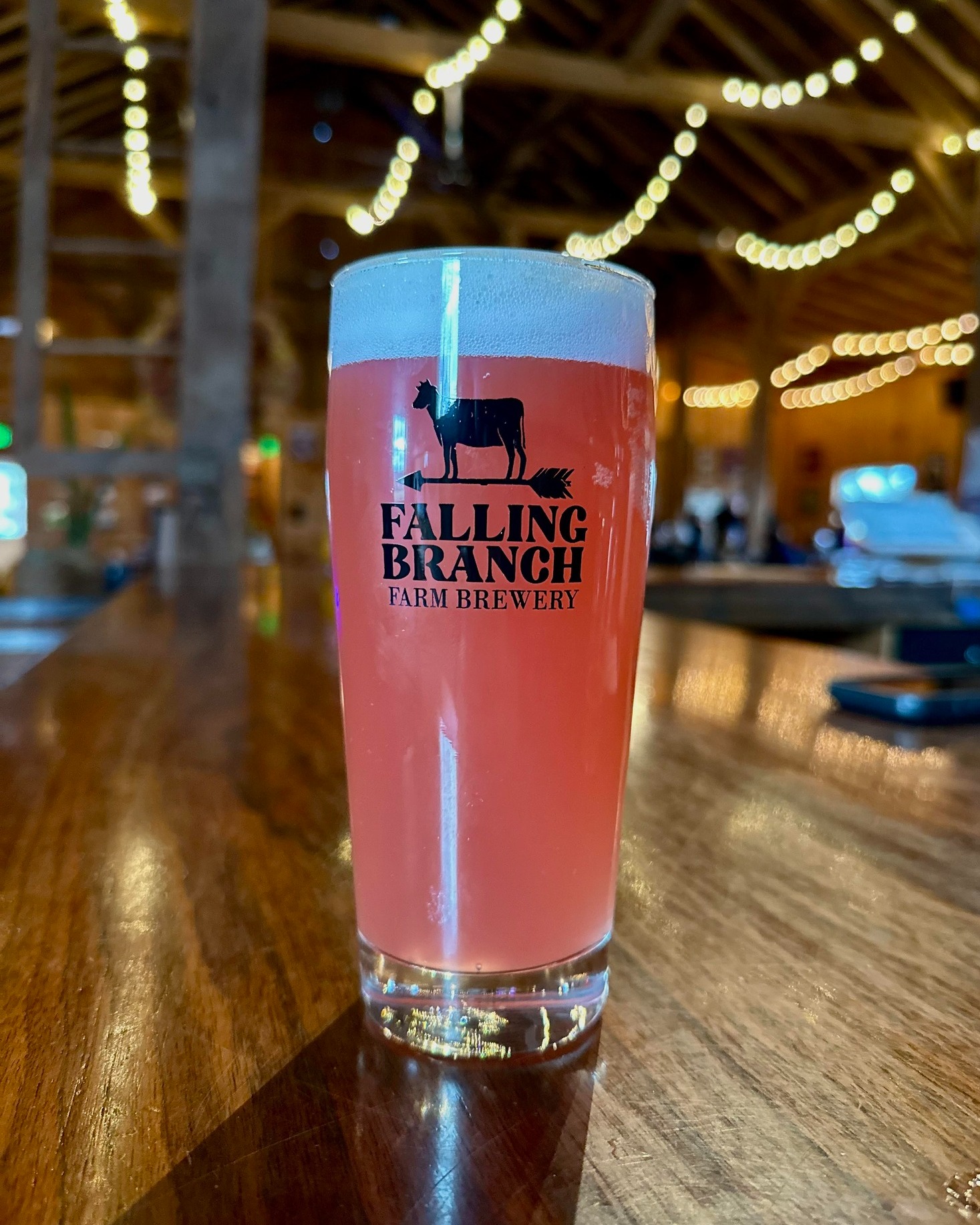 a glass of cherry/apple seltzer