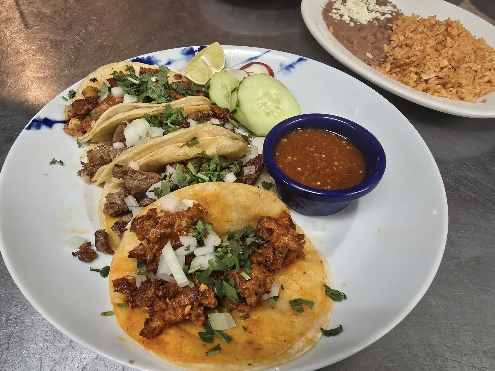 three tacos on a plate