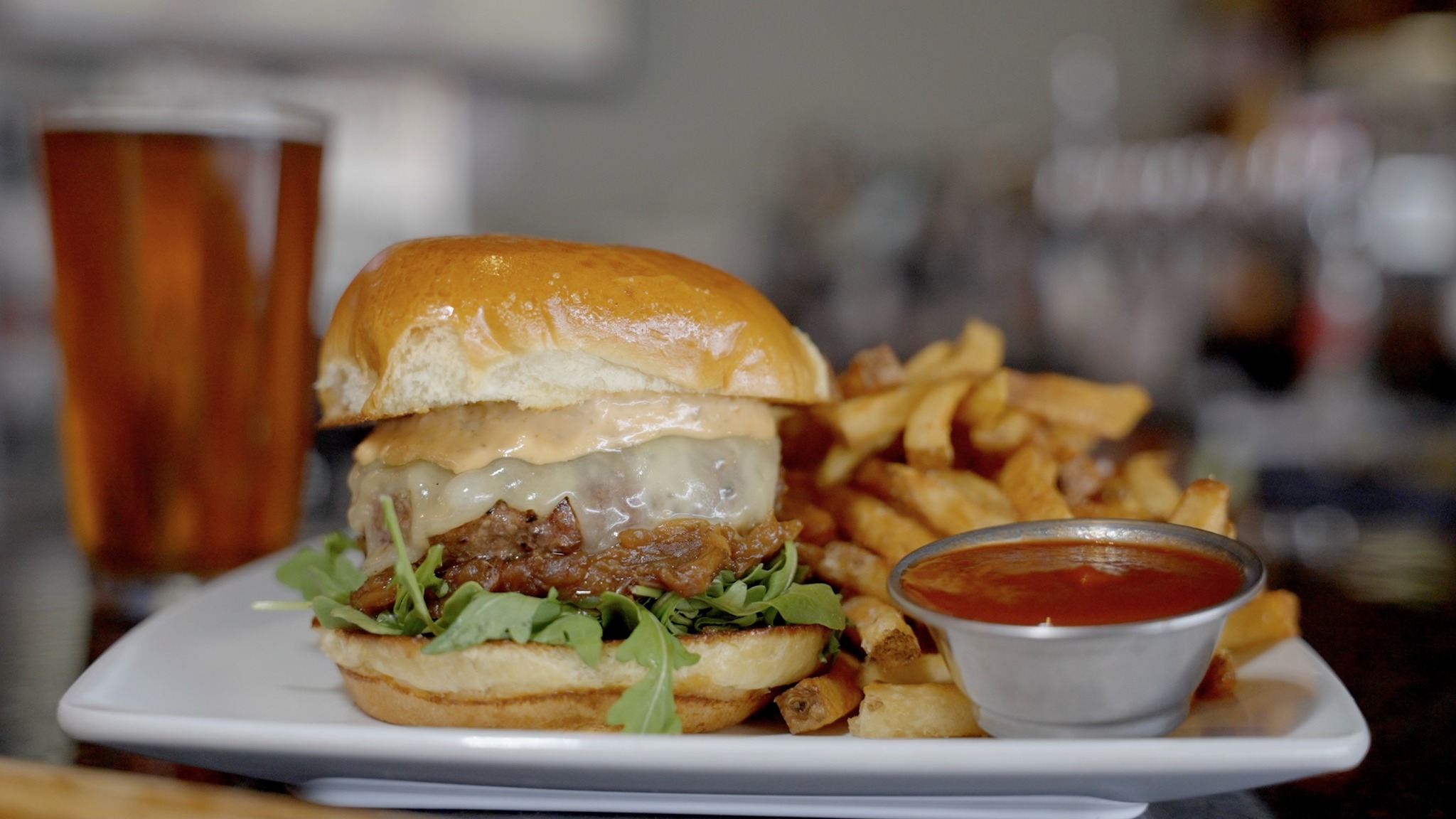 a burger with fries