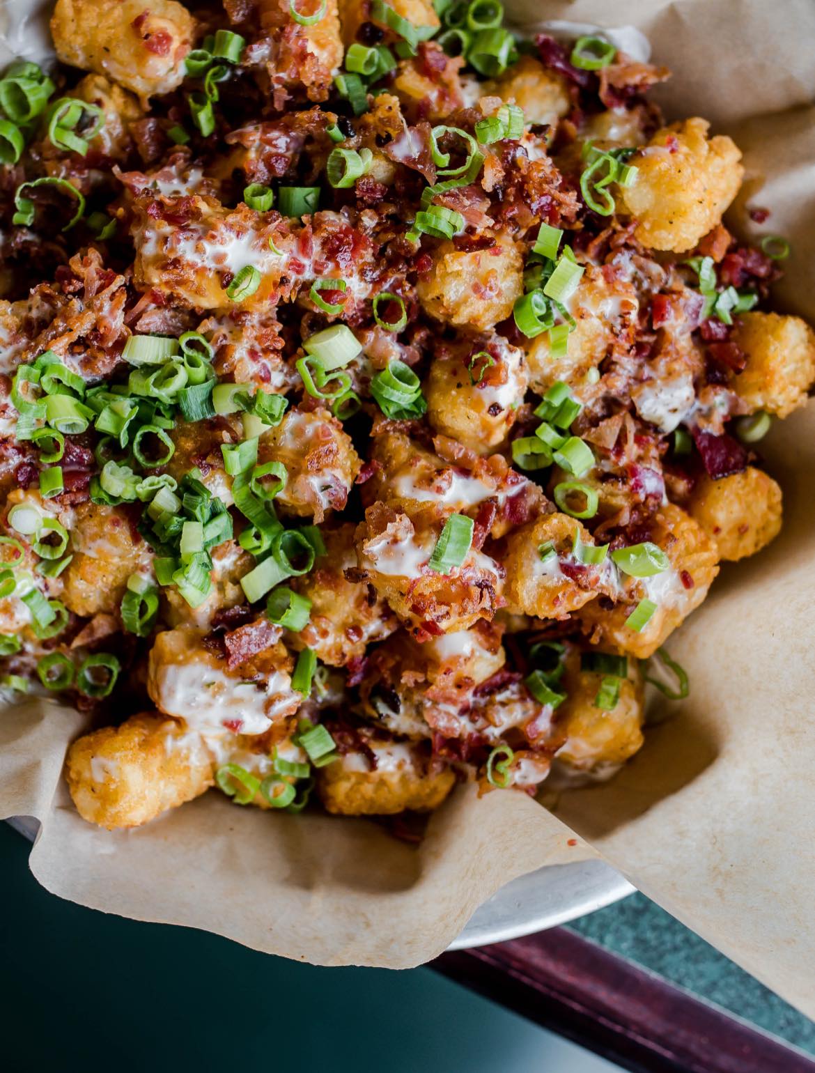 a basket of loaded tots