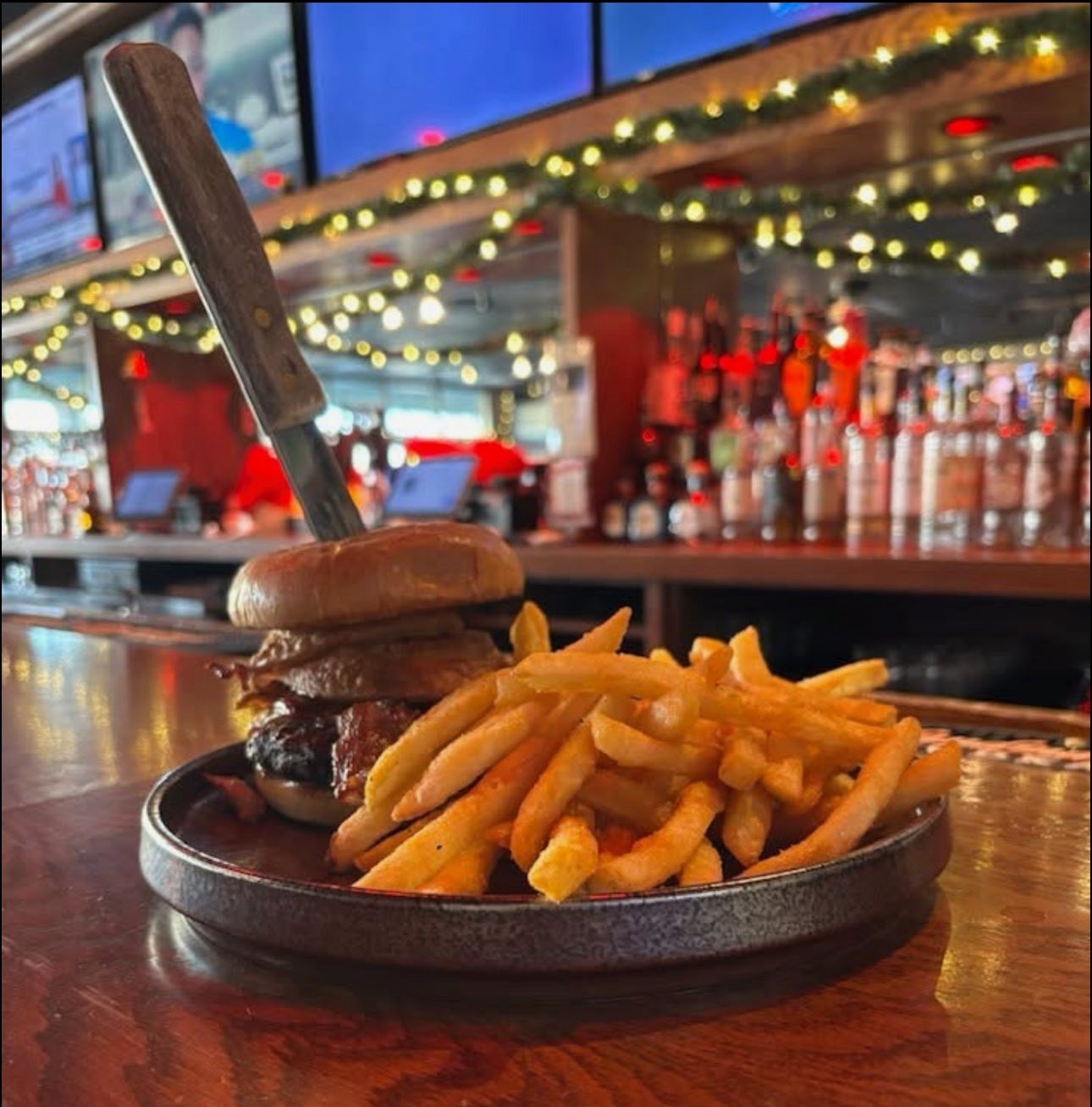 a BBQ burger with fries