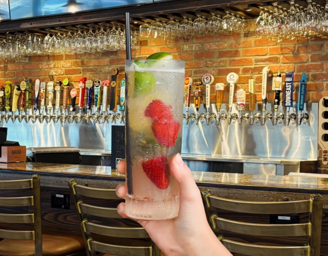 a cocktail with fruits