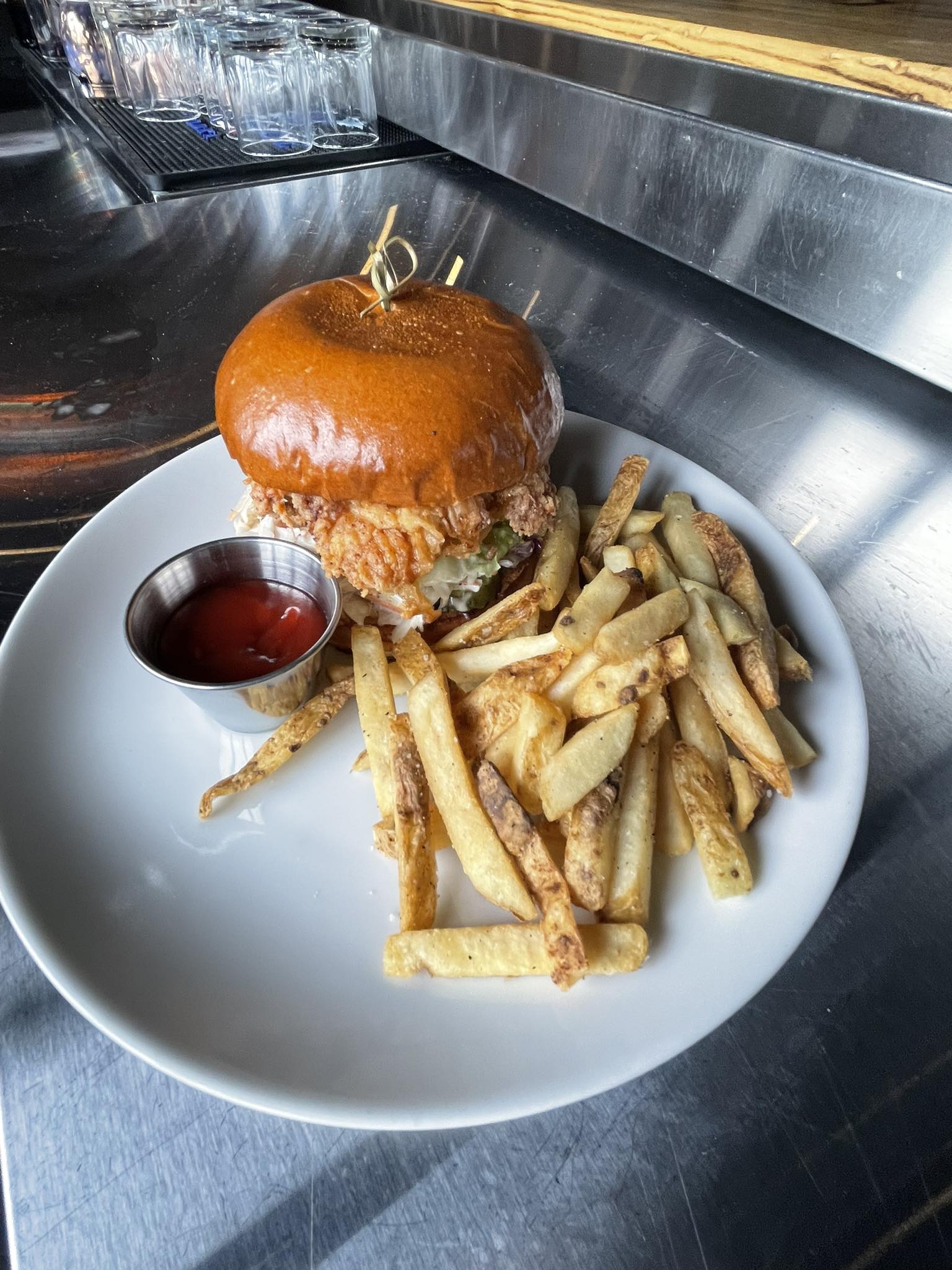 a chicken sandwich with fries