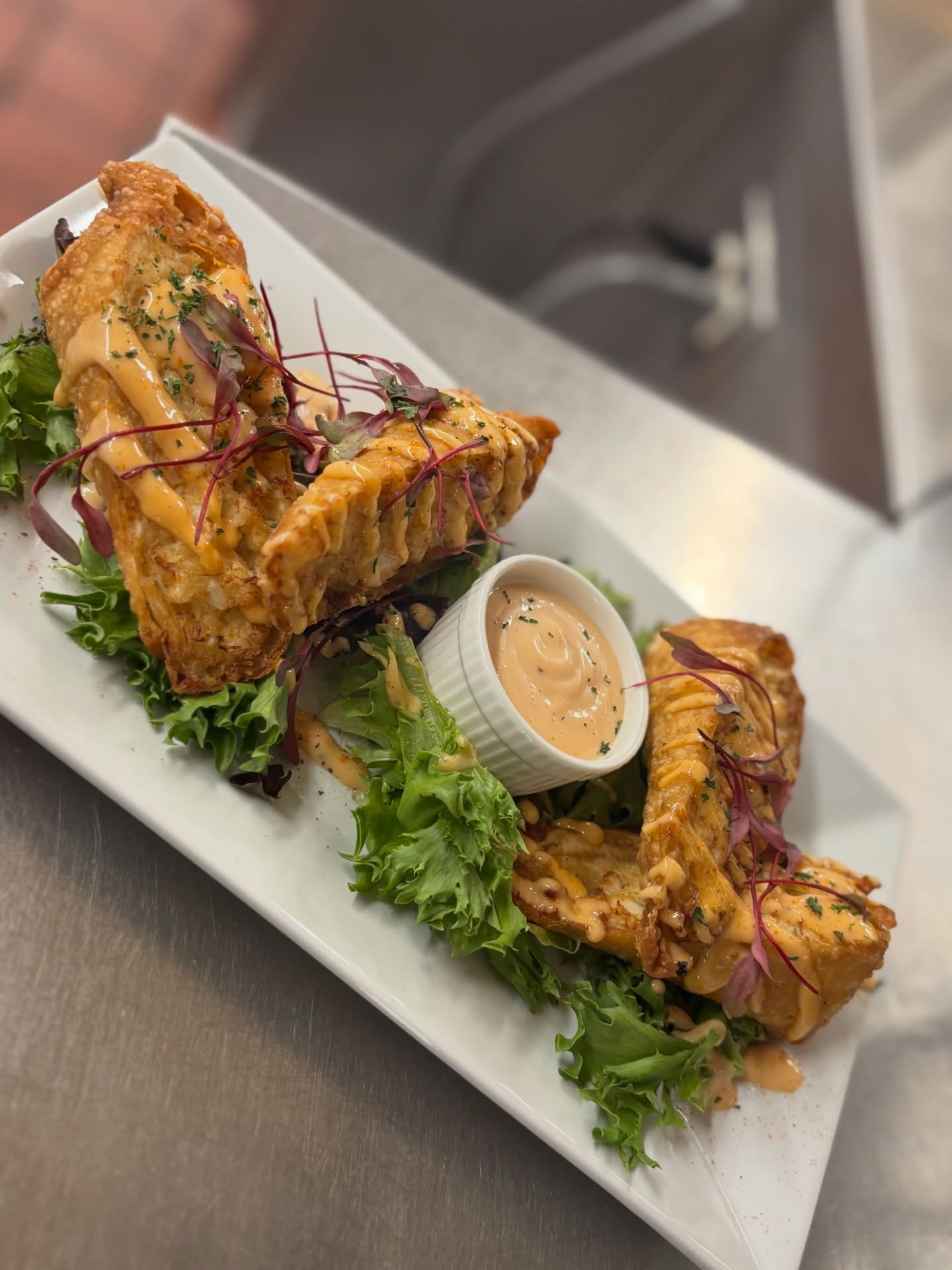 a plate of Crab Cake Egg Rolls